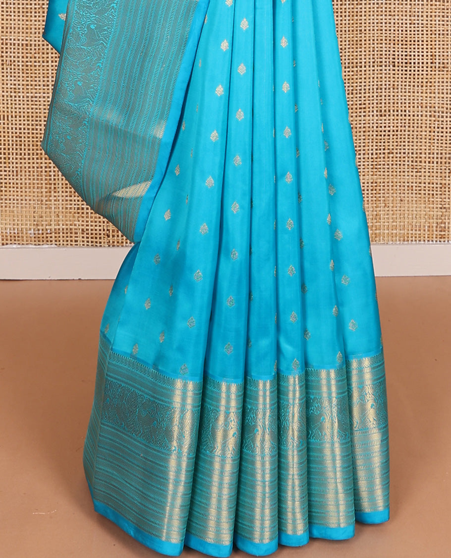 Blue zari buttas Vasundhara silk mix, traditional zari border of mayil, yaali, and muthu designs and paiyaadi kattam pallu