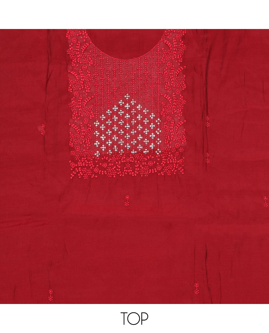 Red material chudidar set, sequins and thread neck embroidered top, plain bottom, and sequins and thread embroidered dupatta