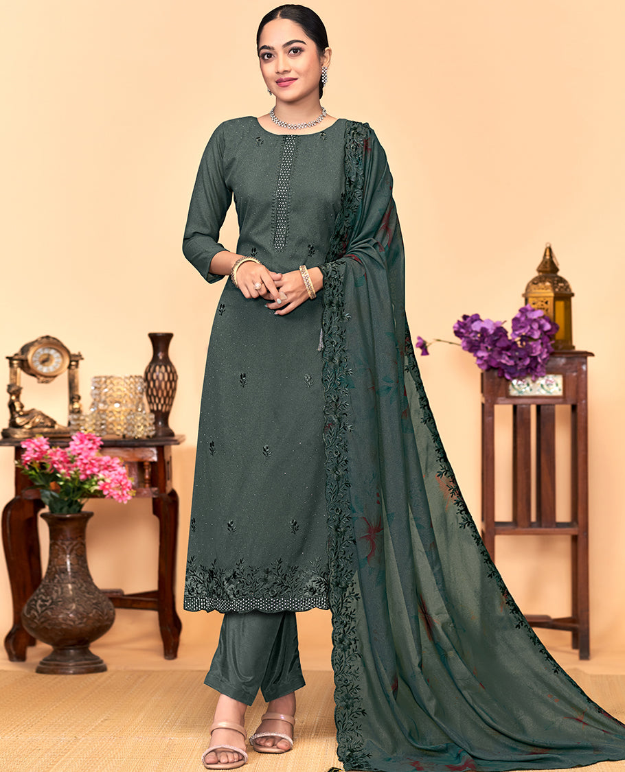 Deep green churidar material set, thread embroidered with stone work top, matching bottom, and floral print with thread embroidered scallop dupatta