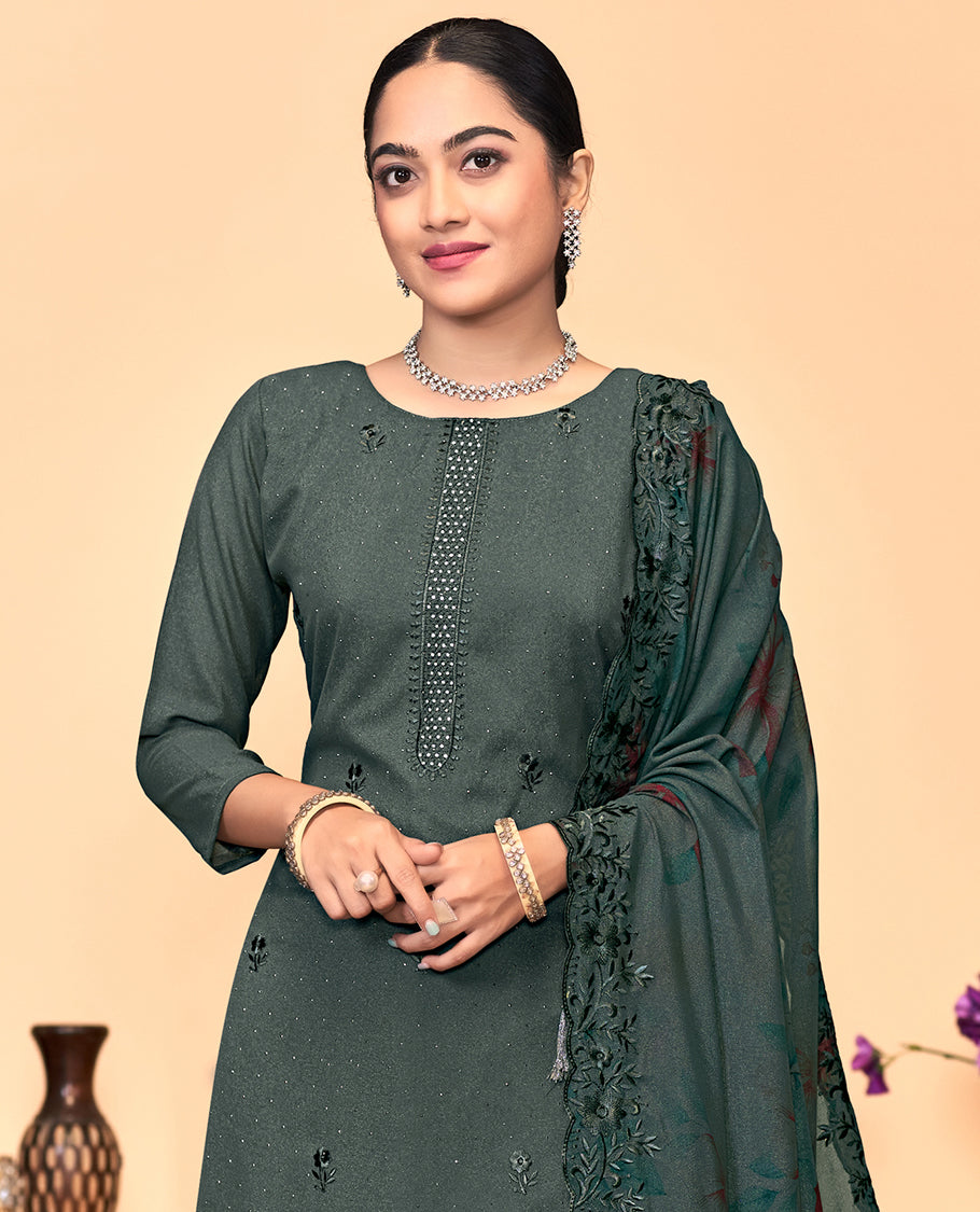 Deep green churidar material set, thread embroidered with stone work top, matching bottom, and floral print with thread embroidered scallop dupatta