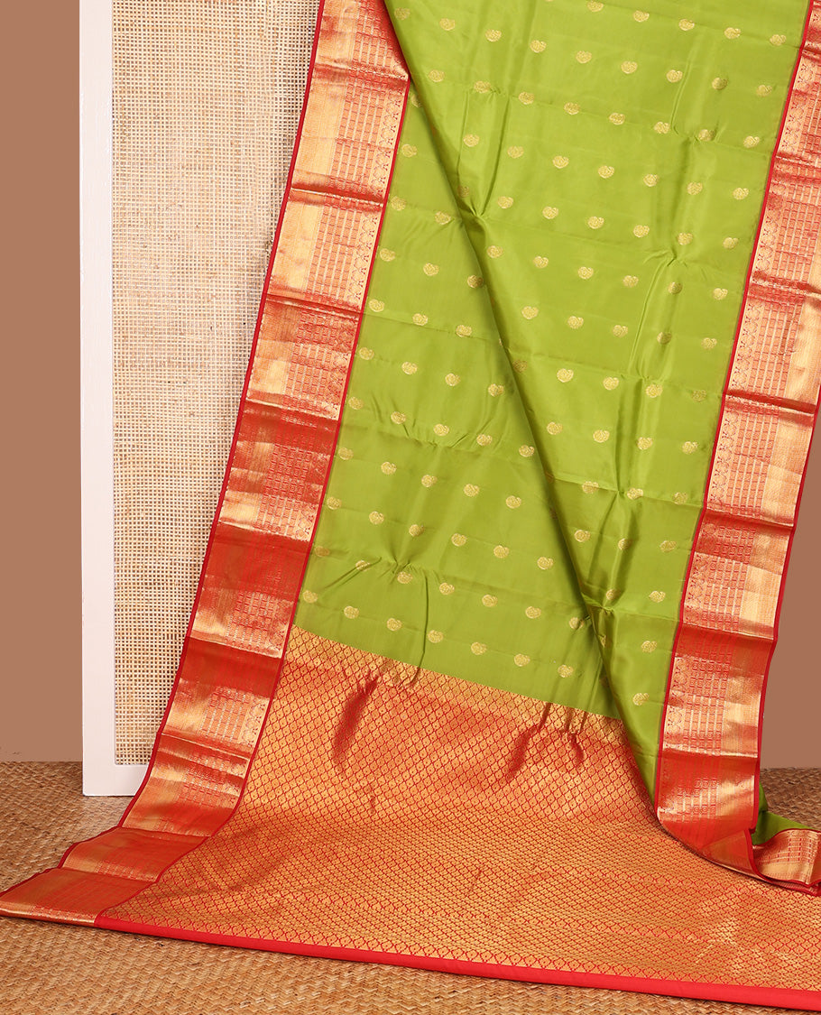 Parrot green manga buttas Vasundhara silk mix, contrast traditional zari border, and intricate pallu