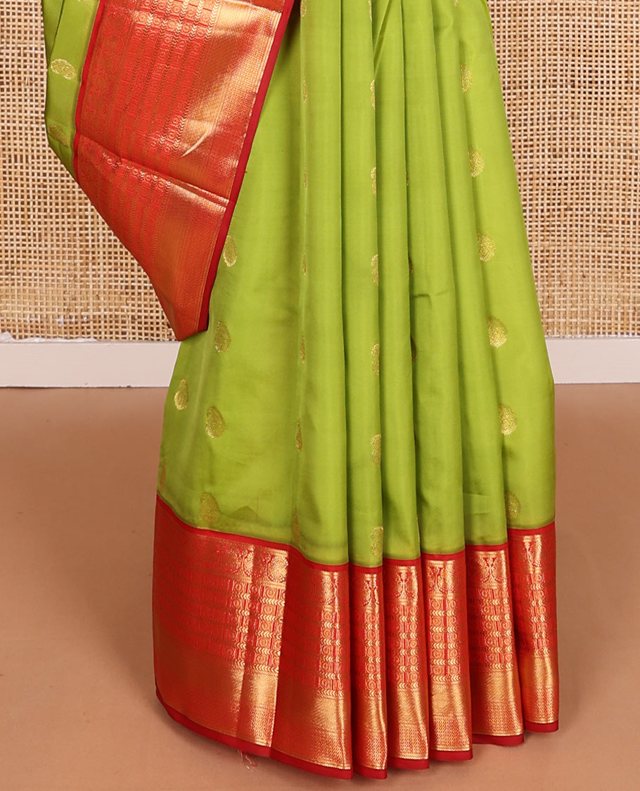 Parrot green manga buttas Vasundhara silk mix, contrast traditional zari border, and intricate pallu