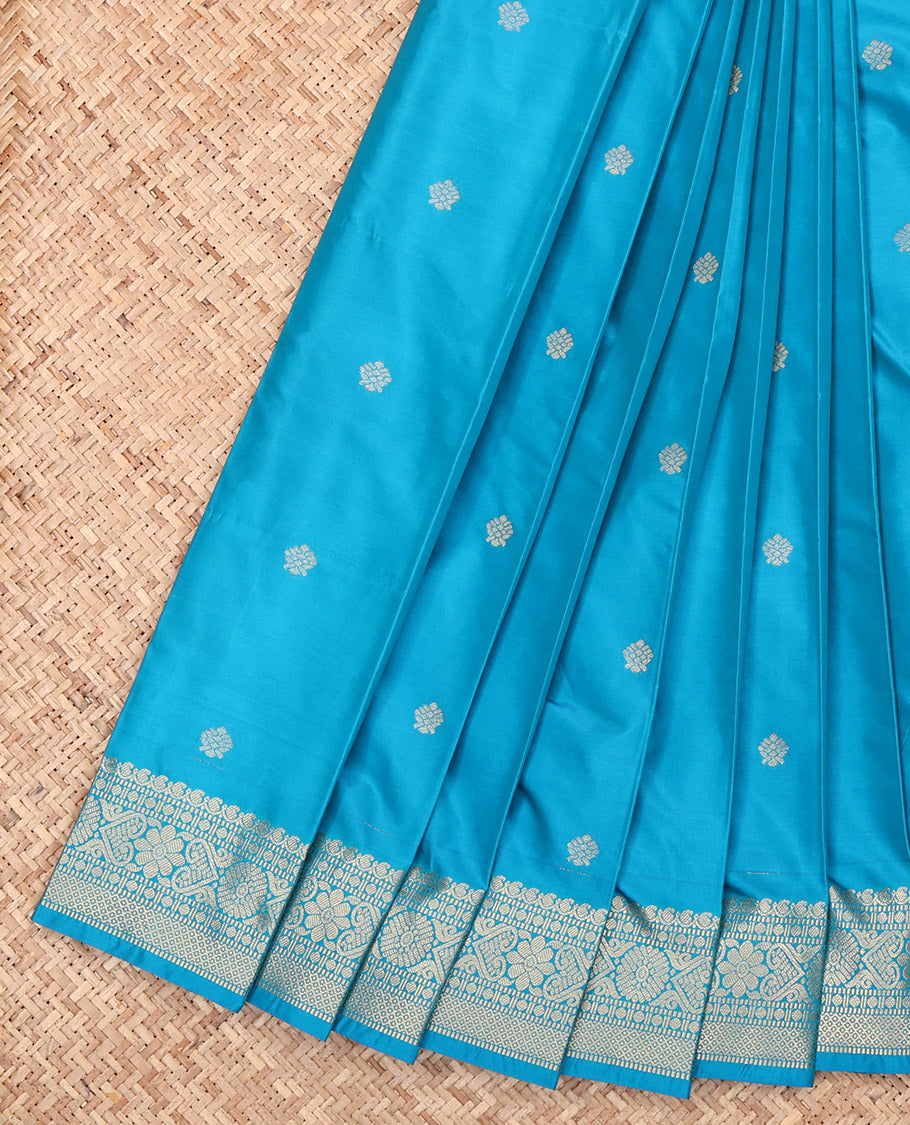 Sky Blue Budget Silk Saree, Sparsely Sparkled with Zari Buttas, Highlighted by a Traditional Zari Border, Jaal Pallu, and a Matching Blouse