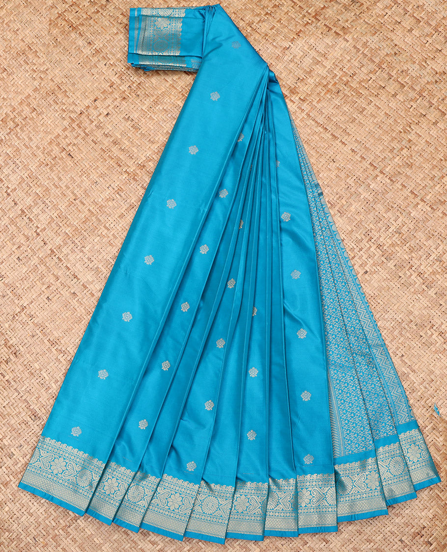 Sky Blue Budget Silk Saree, Sparsely Sparkled with Zari Buttas, Highlighted by a Traditional Zari Border, Jaal Pallu, and a Matching Blouse