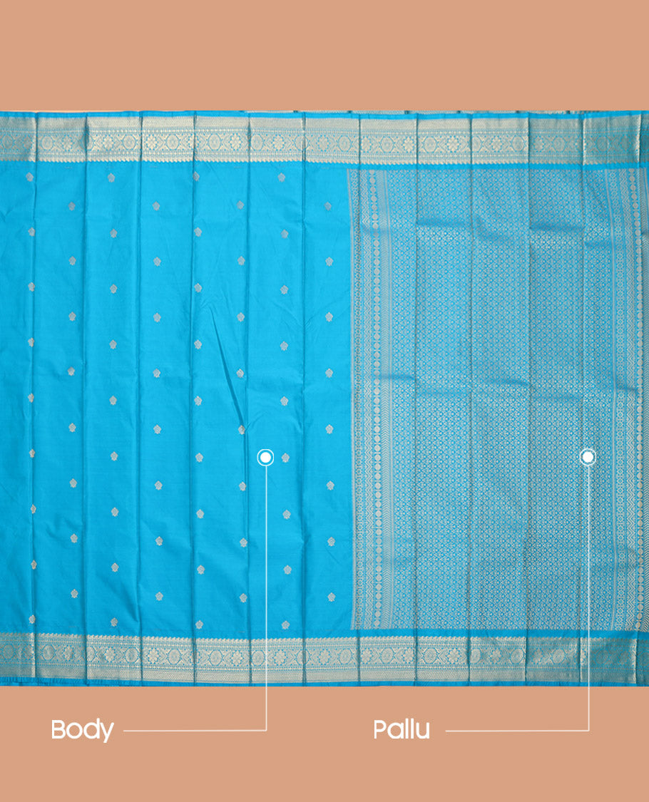 Sky Blue Budget Silk Saree, Sparsely Sparkled with Zari Buttas, Highlighted by a Traditional Zari Border, Jaal Pallu, and a Matching Blouse