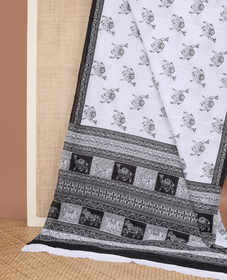 White horse motifs printed mul mul cotton saree, contrast floral creeper printed black border & animal & geometric printed pallu