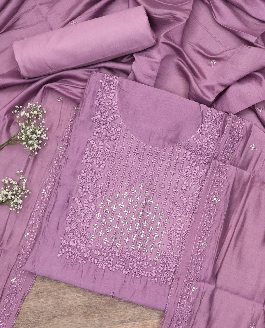 Lavender material chudidar set, sequins and thread neck embroidered top, plain bottom, and sequins and thread embroidered dupatta