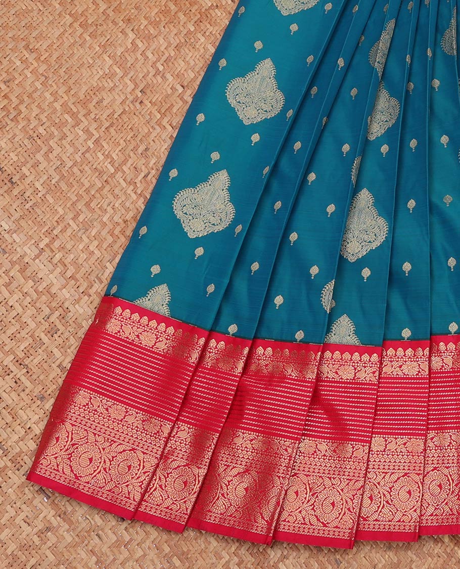 Blue Budget Silk Saree, Decked Up with Zari Buttas, Complemented by a Contrast Traditional Zari Border, Jaal Pallu, and a Contrast Blouse