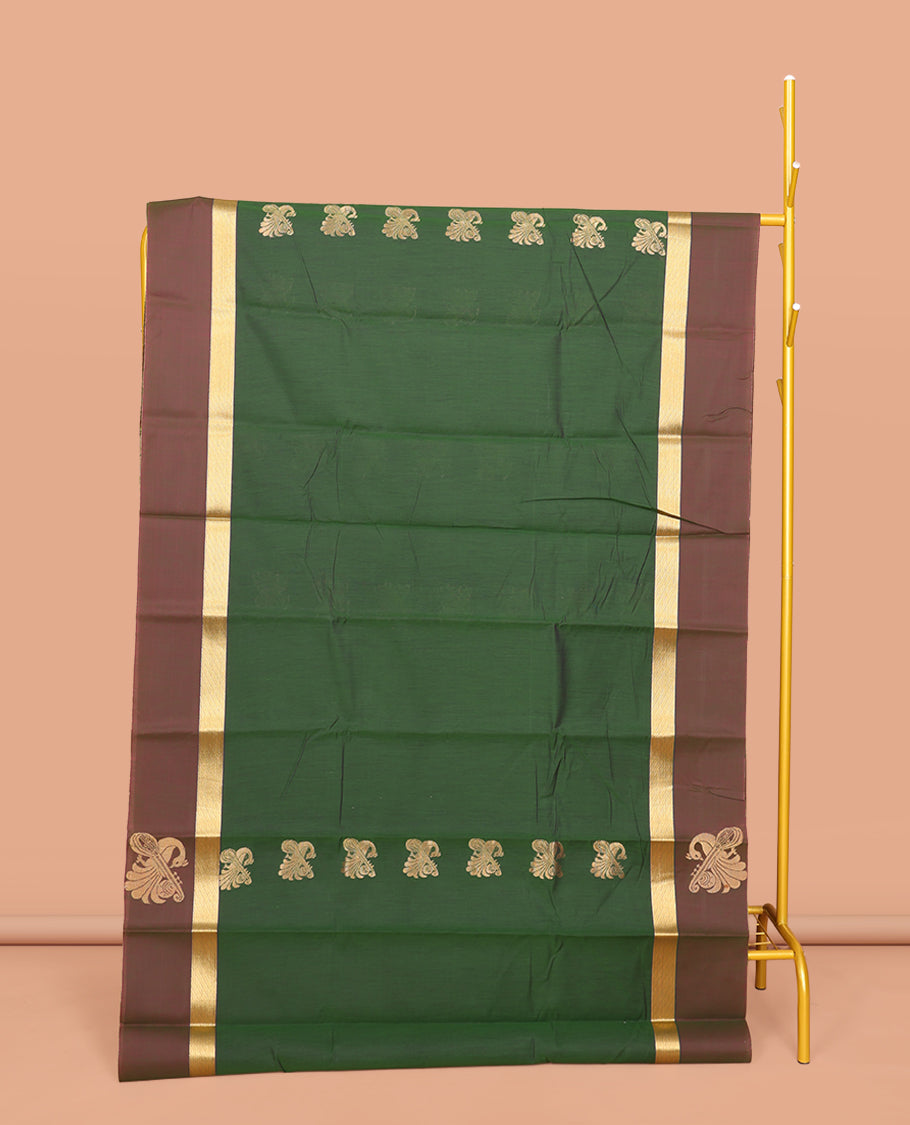 Green Semi-Silk Cotton Saree, Embellished with Zari Buttas All Over Its Body, Complemented by a Contrast Border of Peacock and Veena Designs, Pallu of Peacock Designs, and Paired with a Matching Blouse