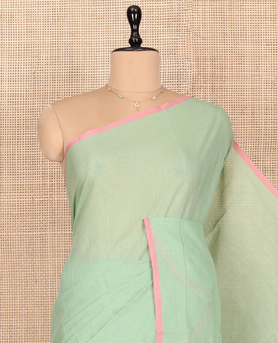 Pale Green Geometric Printed Andhra Cotton Saree, a Contrast Piping Border, Striped Pallu, and a Contrast Blouse