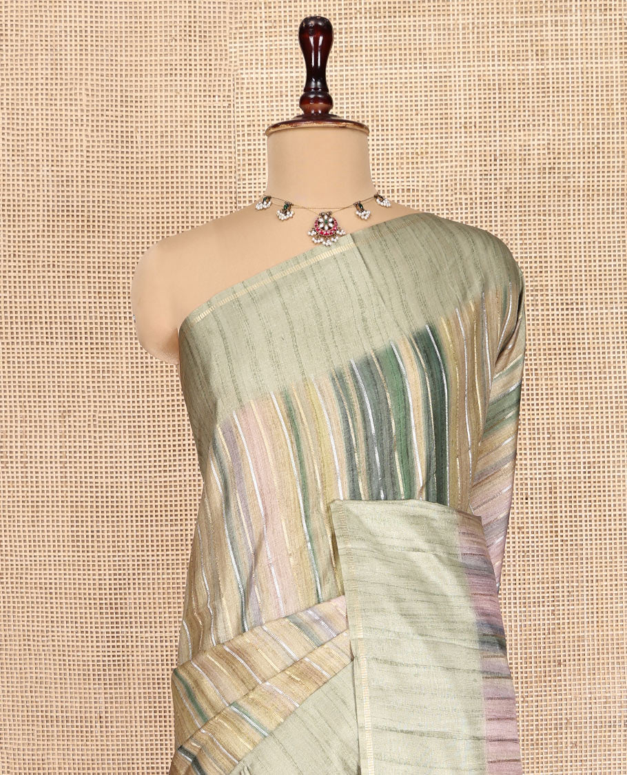 Pista Green Striped Semi-Tussar Silk Saree, Adorned with Vertical Zari Stripes on Its Body, Subtle Zari Border, a Subtle Pallu, and Paired with a Contrast Striped Blouse