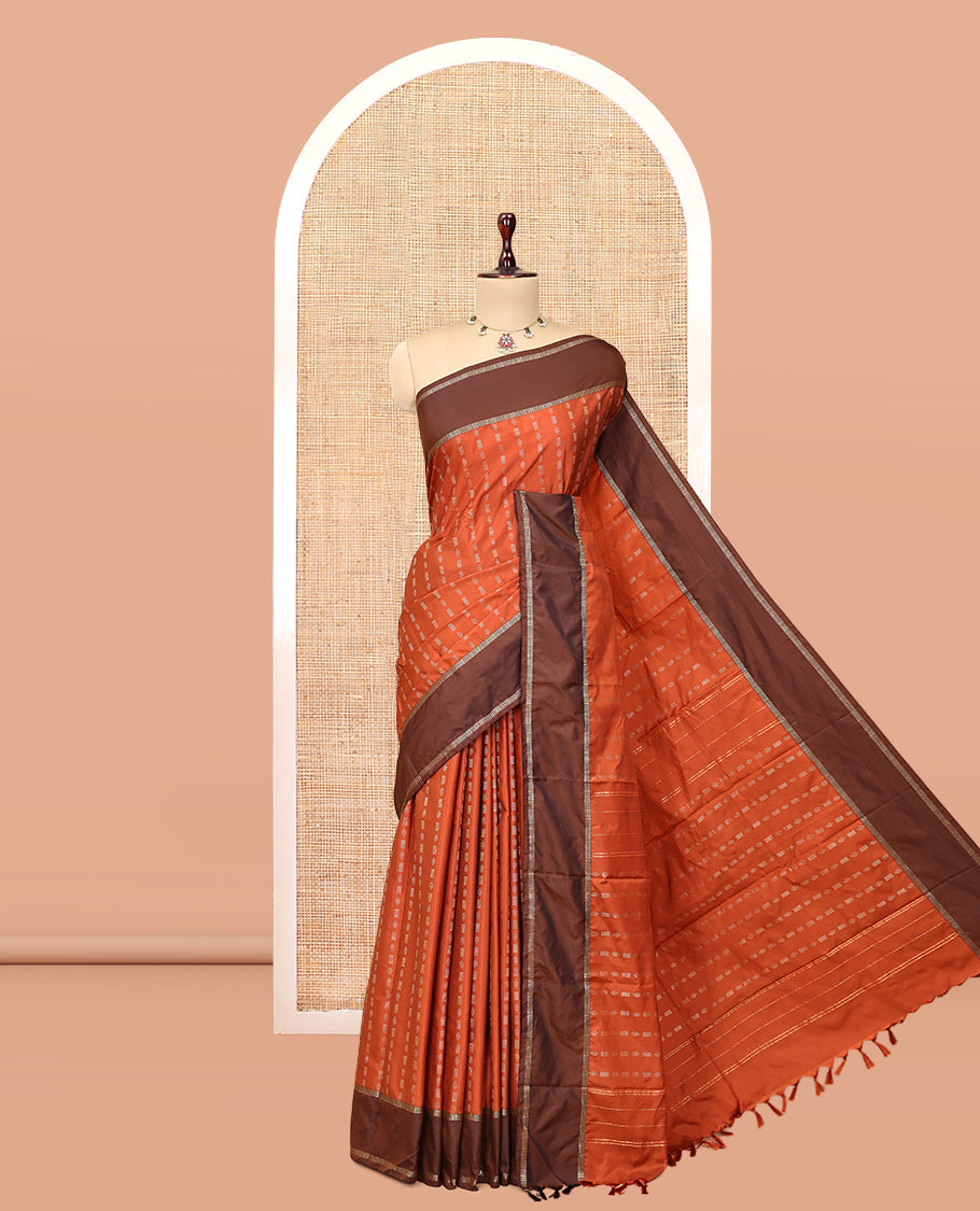 Orange Arani Saree Features Zari Buttas, a Contrast Rettai Pettu Border, Pallu of Zari Designs, and a Matching Blouse