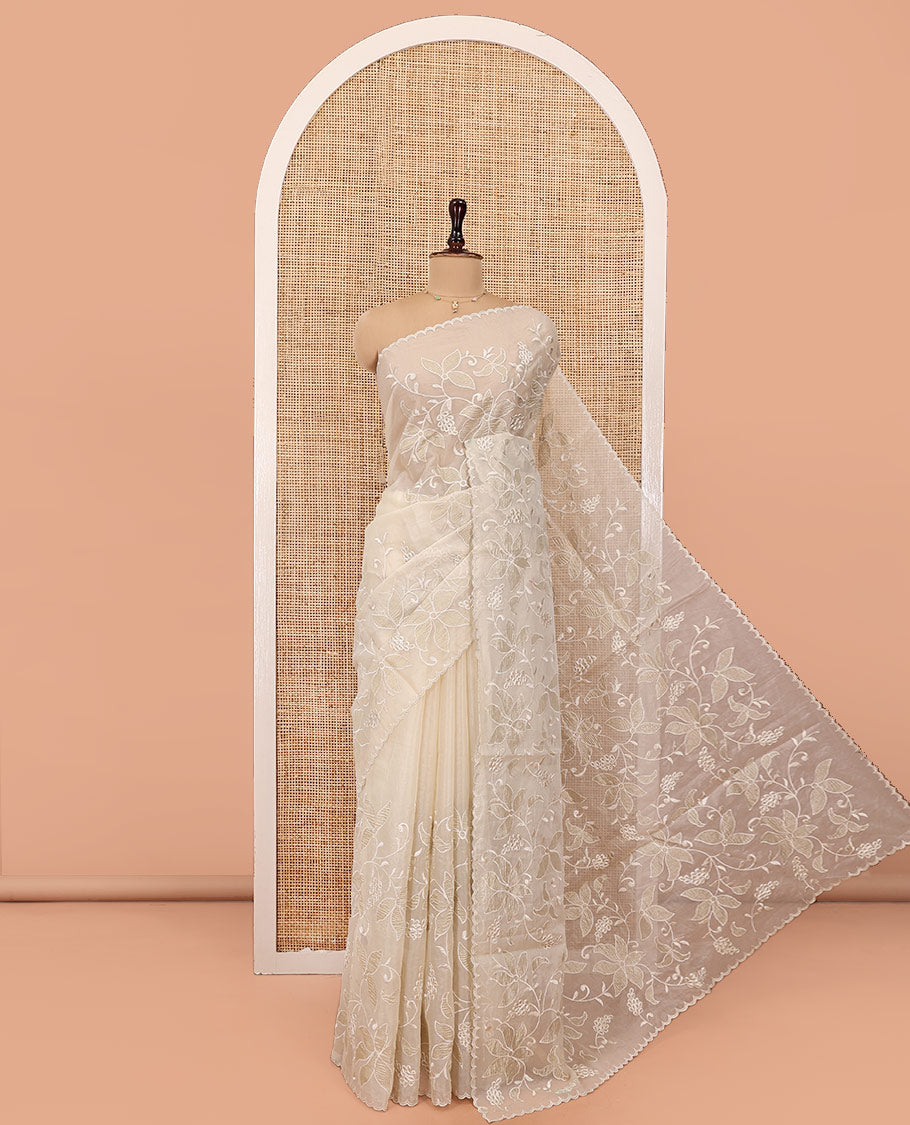 Beige Organza Saree, Finely Crafted with Floral Jaal Applique Embroidery All Over Its Body, Scallop Lace Border, Floral Embroidered Pallu, and Paired With a Embroidered Blouse