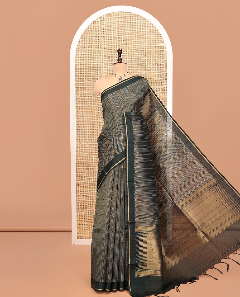 Green Dupion Silk Saree, Embellished with Dotted Stripes, a Zari Border, Gleaming Striped Pallu, and a Matching Blouse