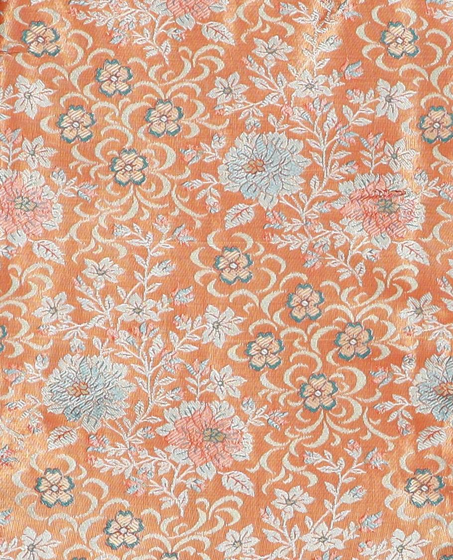 Light Orange Art Silk Material Half Saree Set Featuring Jacquard Skirt, a Contrast Traditional Zari Design Border, a Zari-Jacquard Blouse, and a Dhavani Decked with Zari Designs