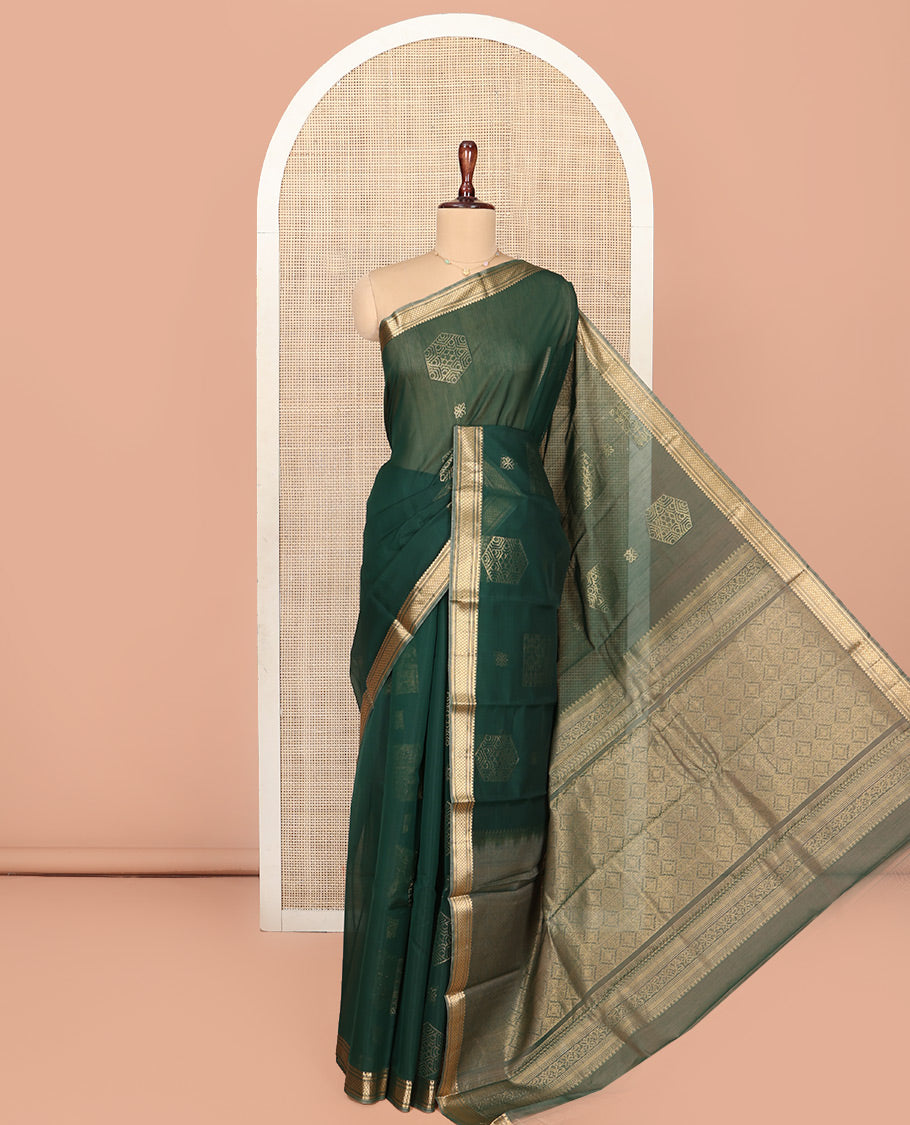 Green Silk Cotton Saree, Embellished with Geometric Buttas All Over Its Body, Highlighted by Traditional Zari Designs Woven Border, Grand Jaal Pallu and Paired with a Matching Blouse