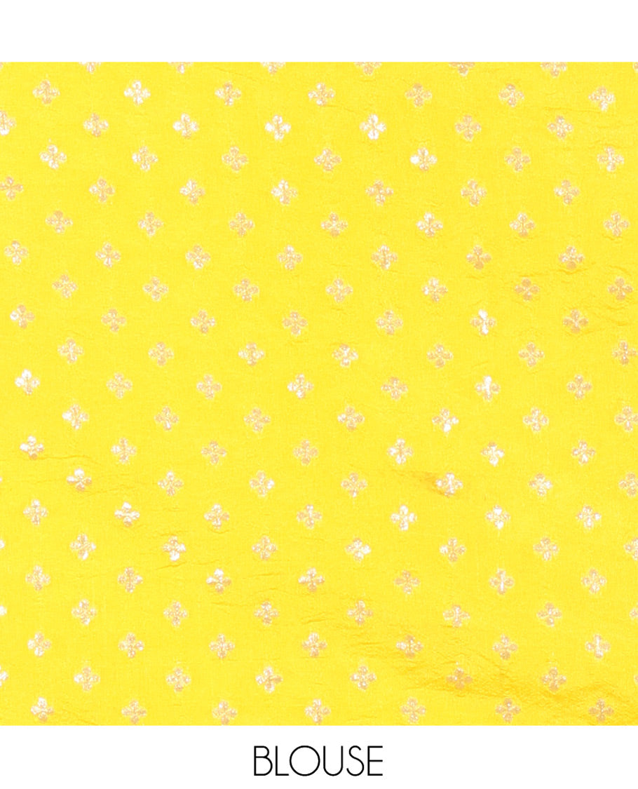 Borderless White-Base Semi-Dupion Saree Embellished with Abstract-Style Floral Prints and Zari Designs Woven All Over Its Body and Pallu, Paired with a Captivating Contrast Floral Buttas Yellow Blouse