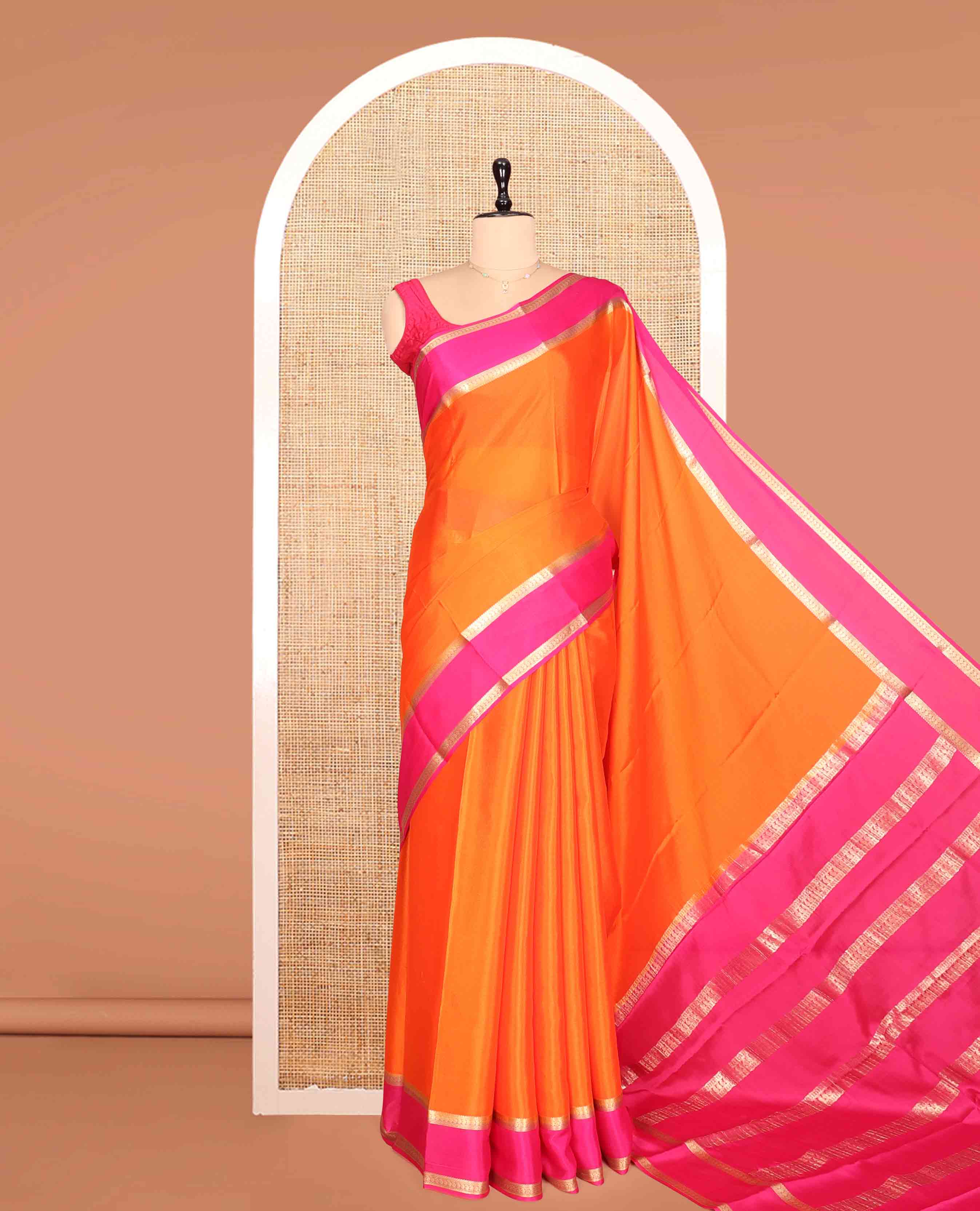 Orange Plain Mysore Silk Saree, a Contrast Traditional Zari Double-Pet Border, Zari Striped Pallu, and a Contrast Blouse