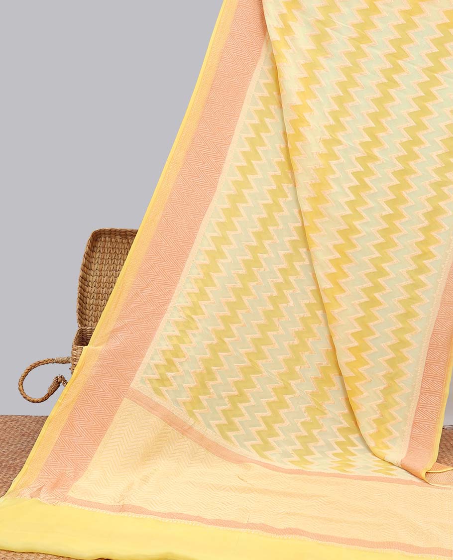 Yellow zig-zag striped banaras georgette saree with contrast border & geometric design pallu