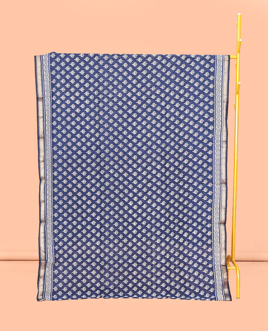 Blue Mul Mul Cotton Saree, Decked Up with Floral Buttas, a Piping Border, Printed Pallu, and a Matching Blouse