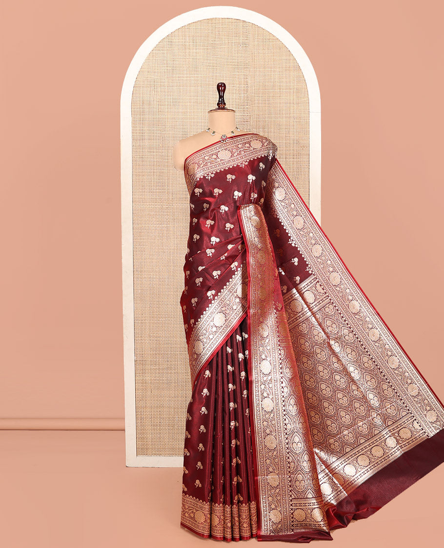 Maroon Banarasi Nylon Saree, Embellished with Zari Buttas, Highlighted by a Floral Creeper Zari Border, Intricate Pallu, and a Matching Blouse