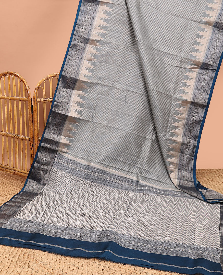 Light grey checked tussar saree with contrast traditional zari design border & chevron design pallu