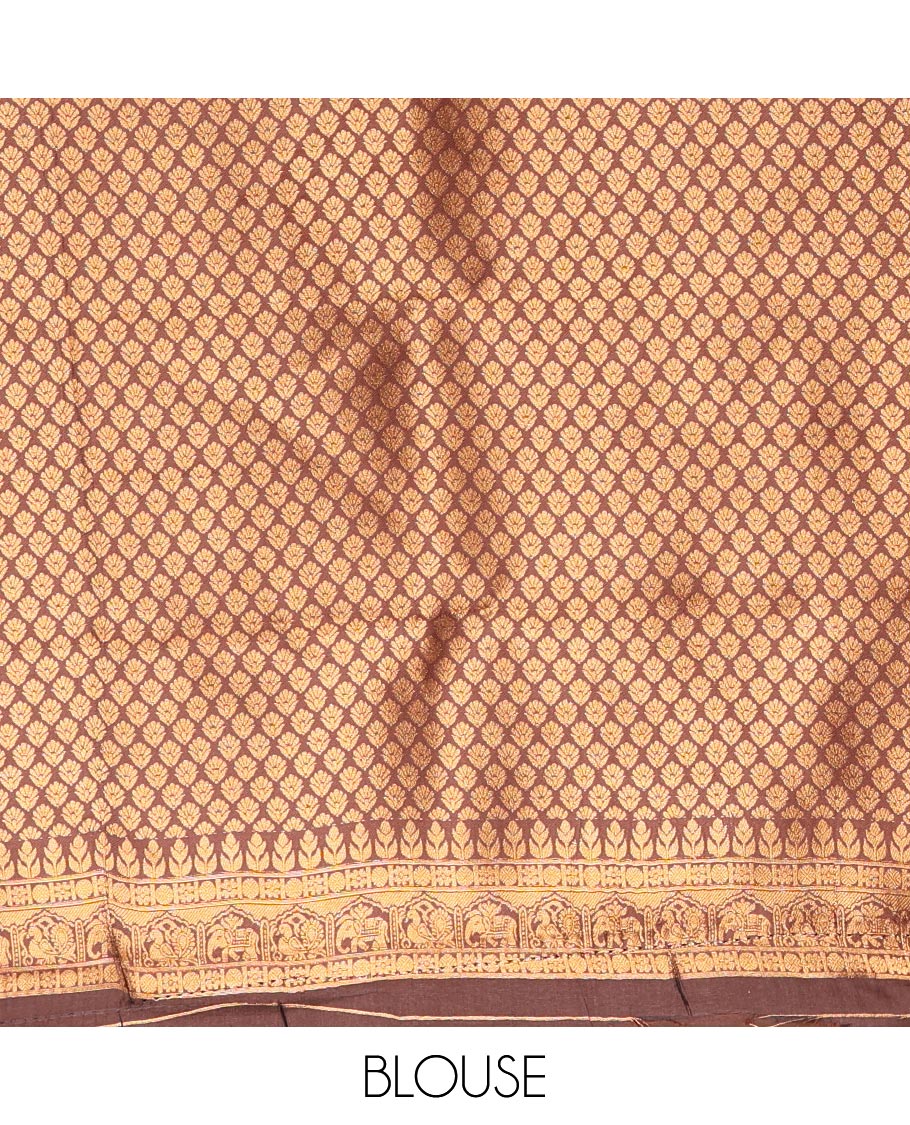 Rust Orange Kanchi Silk Saree, Accentuated with Zari Jacquard Design All Over Its Body, Complemented by a Contrast Traditional Zari Border of Chakram Designs, Majestically Detailed Pallu, and Paired with a Contrast Blouse