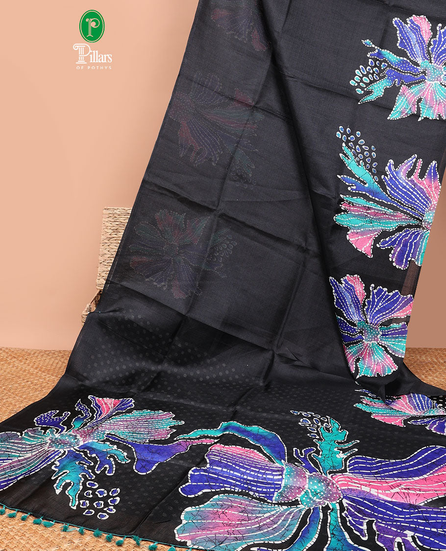 Borderless black printed orchid design semi khadhi saree with printed self, tussels pallu & all over dotted blouse