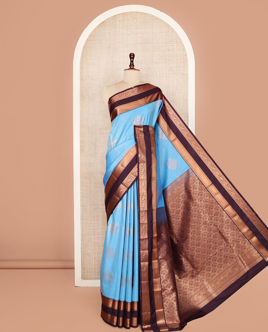 Blue Budget Silk Saree, Embellished with Zari Stripes and Kolam Buttas All Over Its Body, Complemented by a Contrast Traditional Zari Design Rettai Pettu Border, Grand Scallop Design Pallu, and Paired with a Contrast Blouse