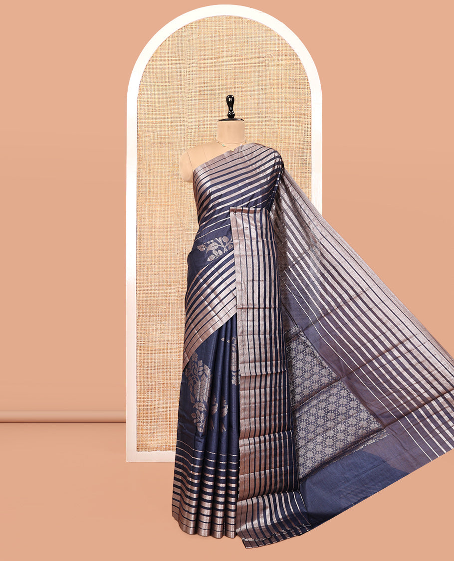 Borderless Blue Tussar Silk Saree, Gracefully Embellished with Zari Stripes and Floral Buttas, Striped Pallu, and a Matching Blouse