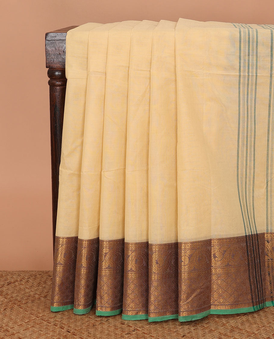 Cream plain Chettinad cotton saree, contrast temple traditional zari border, and striped pallu