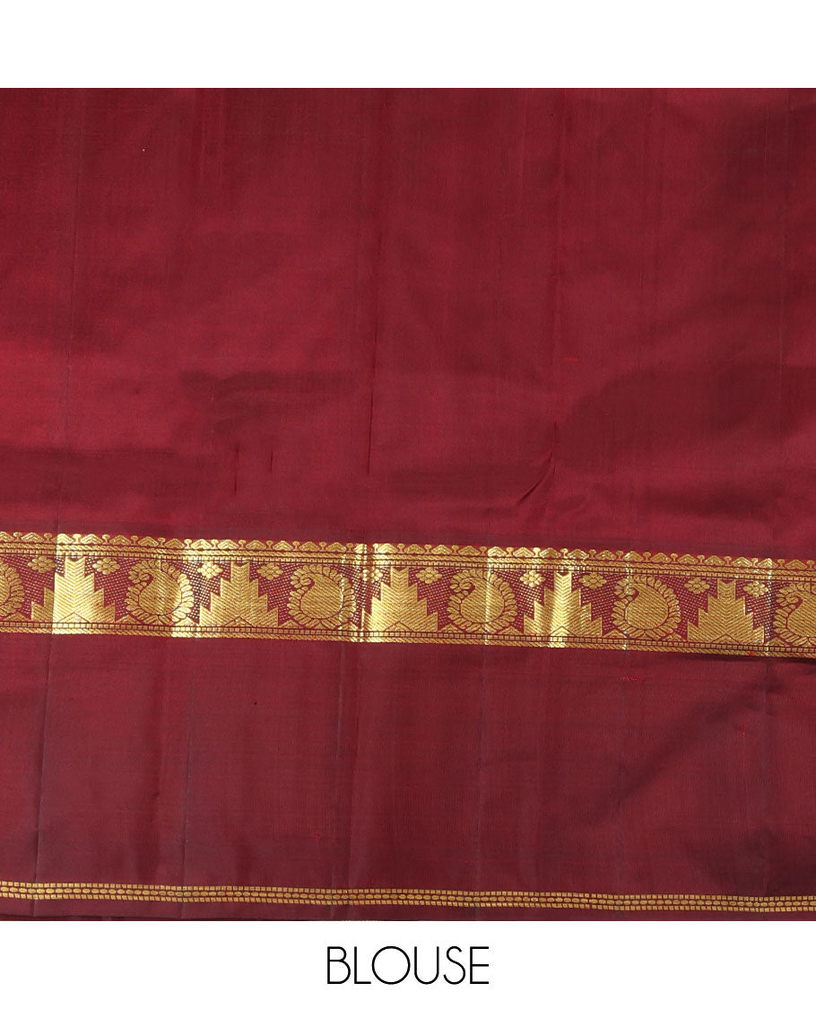 Rust Kanchipuram Silk Saree, Woven with Buttas, Complemented by a Contrast Rettai Pettu Border of Thazampoo Rekku and Arumbu Manga, Zari Design Pallu, and Contrast Blouse