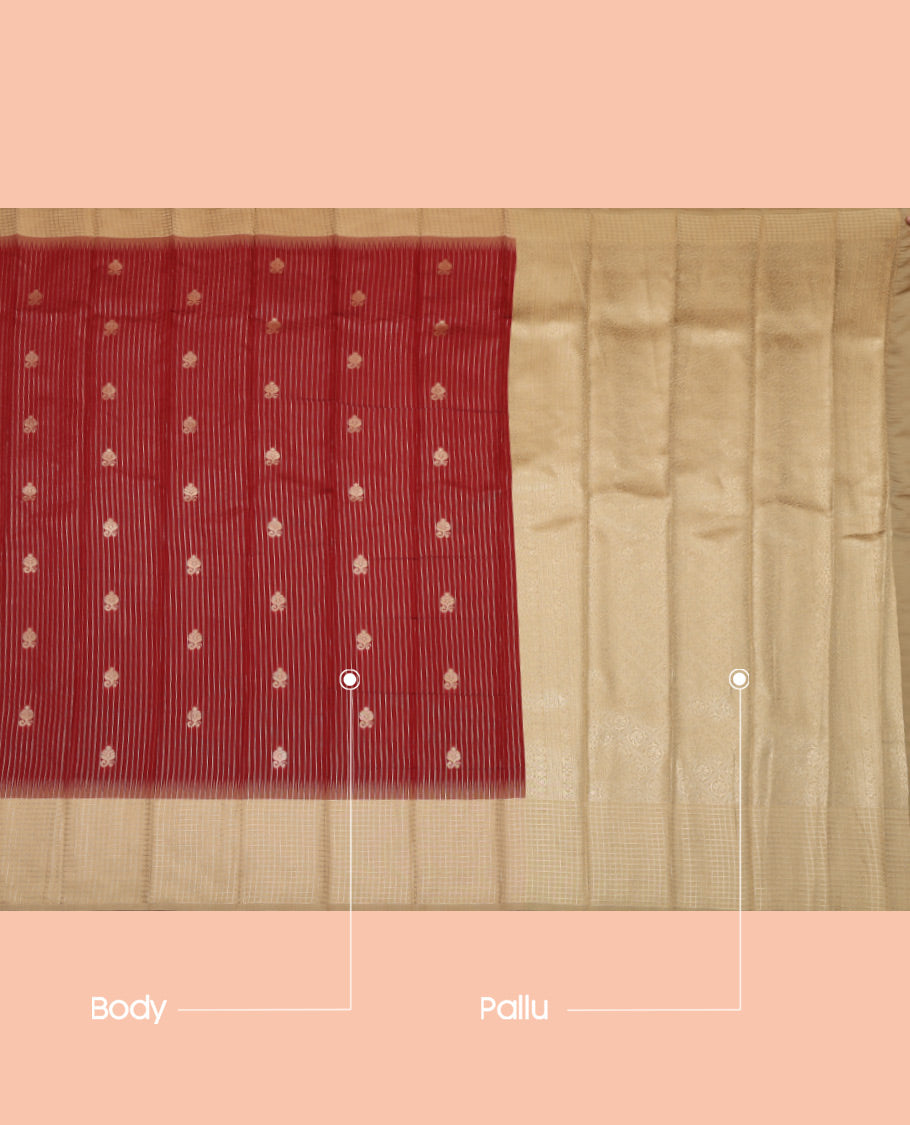 Maroon Litchi Saree, Gleamed Up with Zari Buttas and Stripes, a Contrast Zari Checked Border, Grand Pallu, and a Contrast Blouse