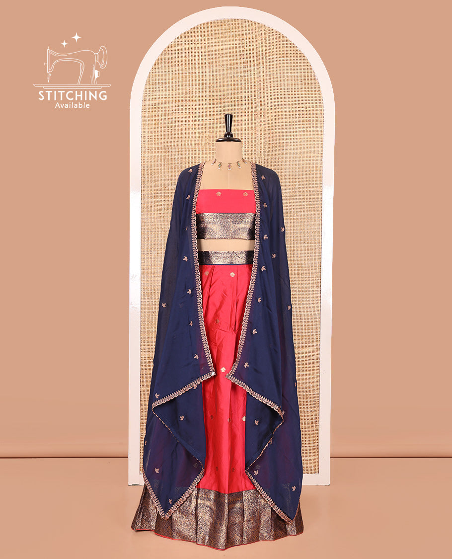 Pink and Blue Semi-Banarasi Half-Saree, Elegantly Woven with Zari Buttas on Its Skirt, Complemented by a Contrast Geometric Patterns Zari Woven Border, Paired with a Matching Blouse, and a Contrast Satin Georgette Embroidered Scallop Dhavani