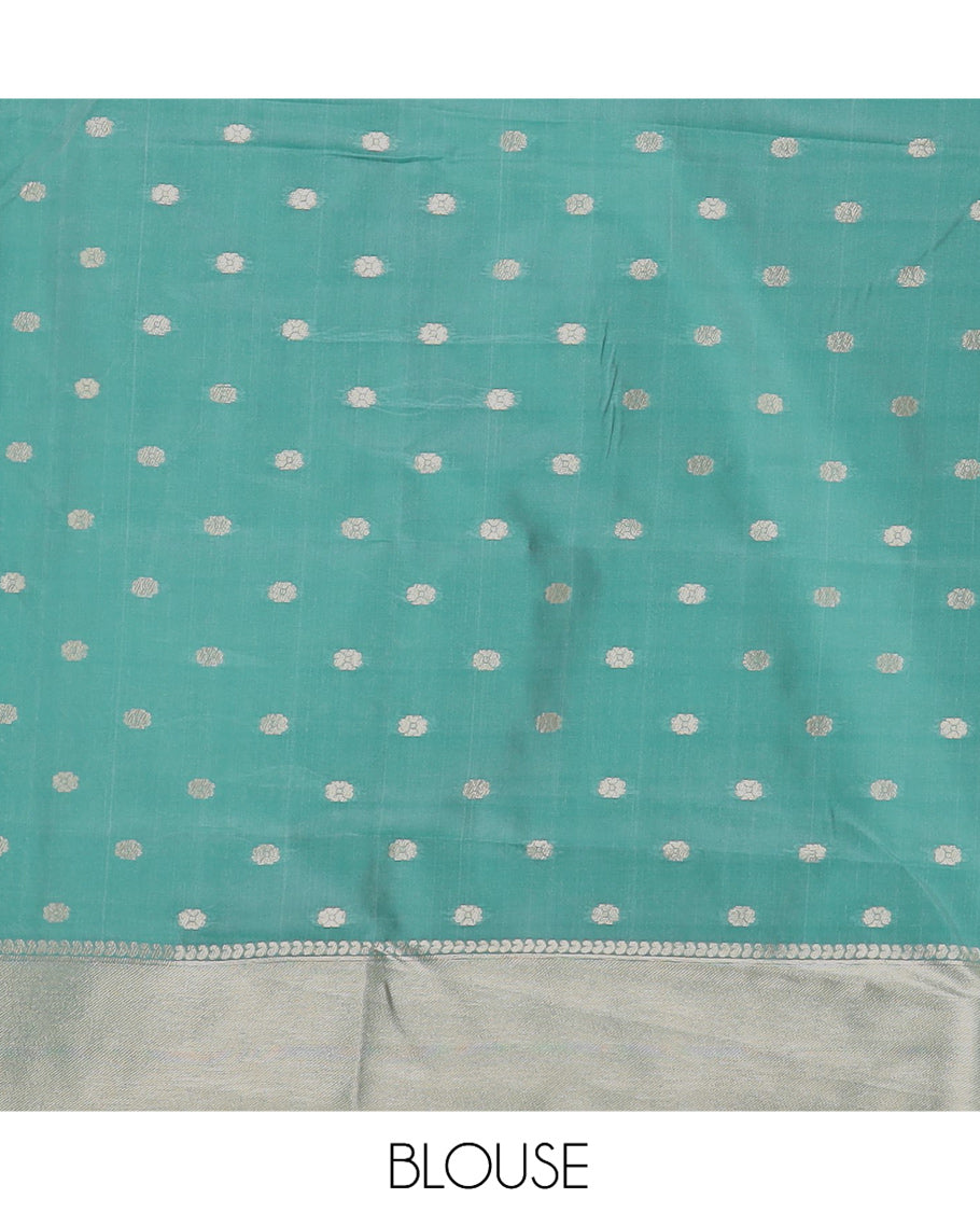 Off-White-Leaf Green Semi-Silk Saree, Adorned with Floral Jacquard Design, a Zari Paisley Border, and a Contrast Blouse