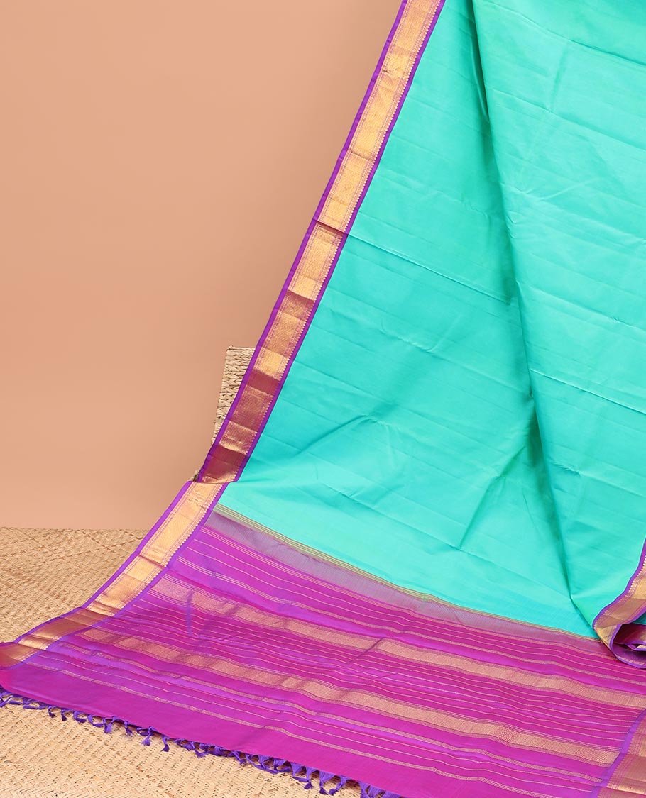 Blue kancheeuram silk saree with contrast korvai zari design border & striped pallu