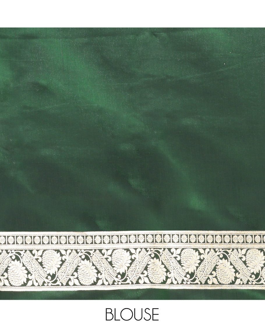 Green Semi-Banaras Saree, Spotlighted with Floral Buttas on Its Body, Highlighted by a Floral Creeper Border, Intricately Designed Pallu, and Paired with a Matching Blouse