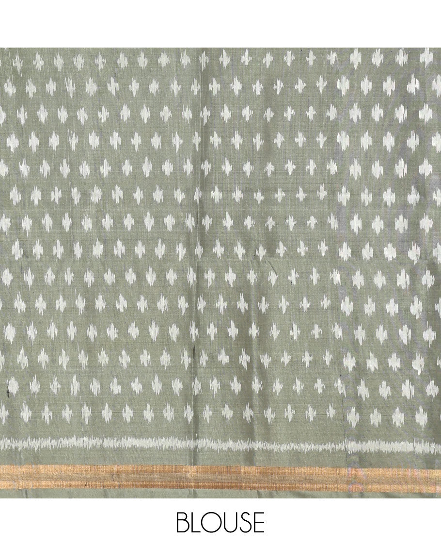 Green Mayuri Soft Silk Saree, Impeccably Styled with Ikat Design, a Piping Border, and a Pallu Features an Intricate Ikat Weave and a Matching Blouse