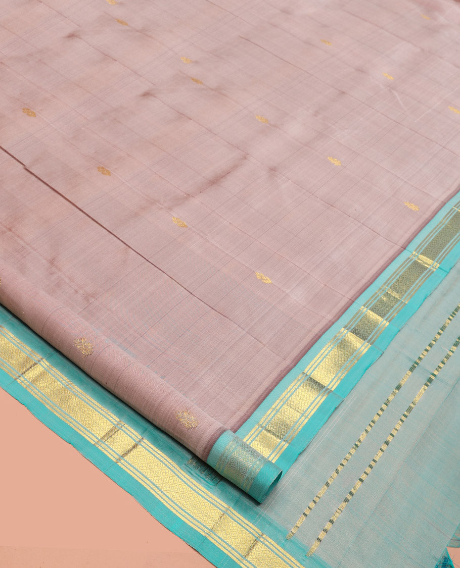 Pink Kanchipuram Silk Saree, Finely Crafted with Zari Buttas, a Contrast One-Sided Border of Jaal Design, Zari Design Pallu, and No Blouse