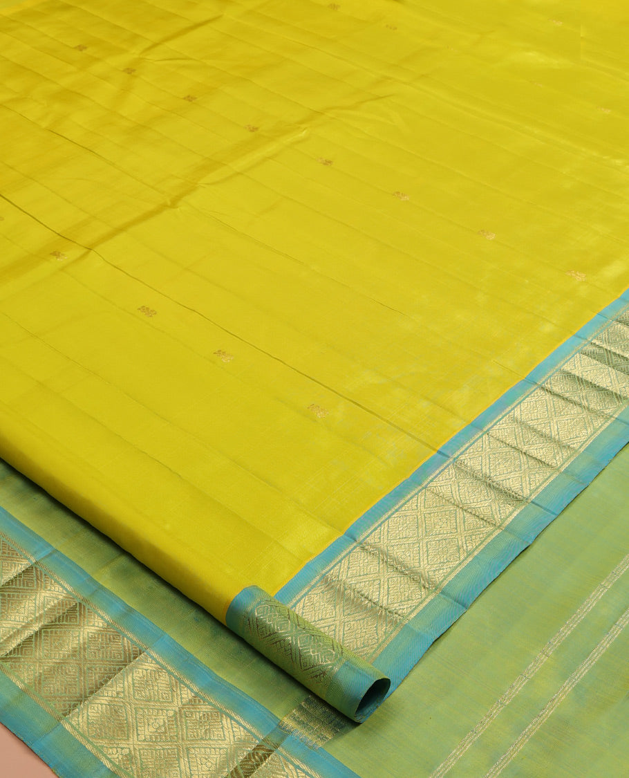 Green Kanchipuram Silk Saree, Woven with Zari Buttas, a Contrast Jaal Design One-sided Border, Zari Woven Pallu, and No Blouse