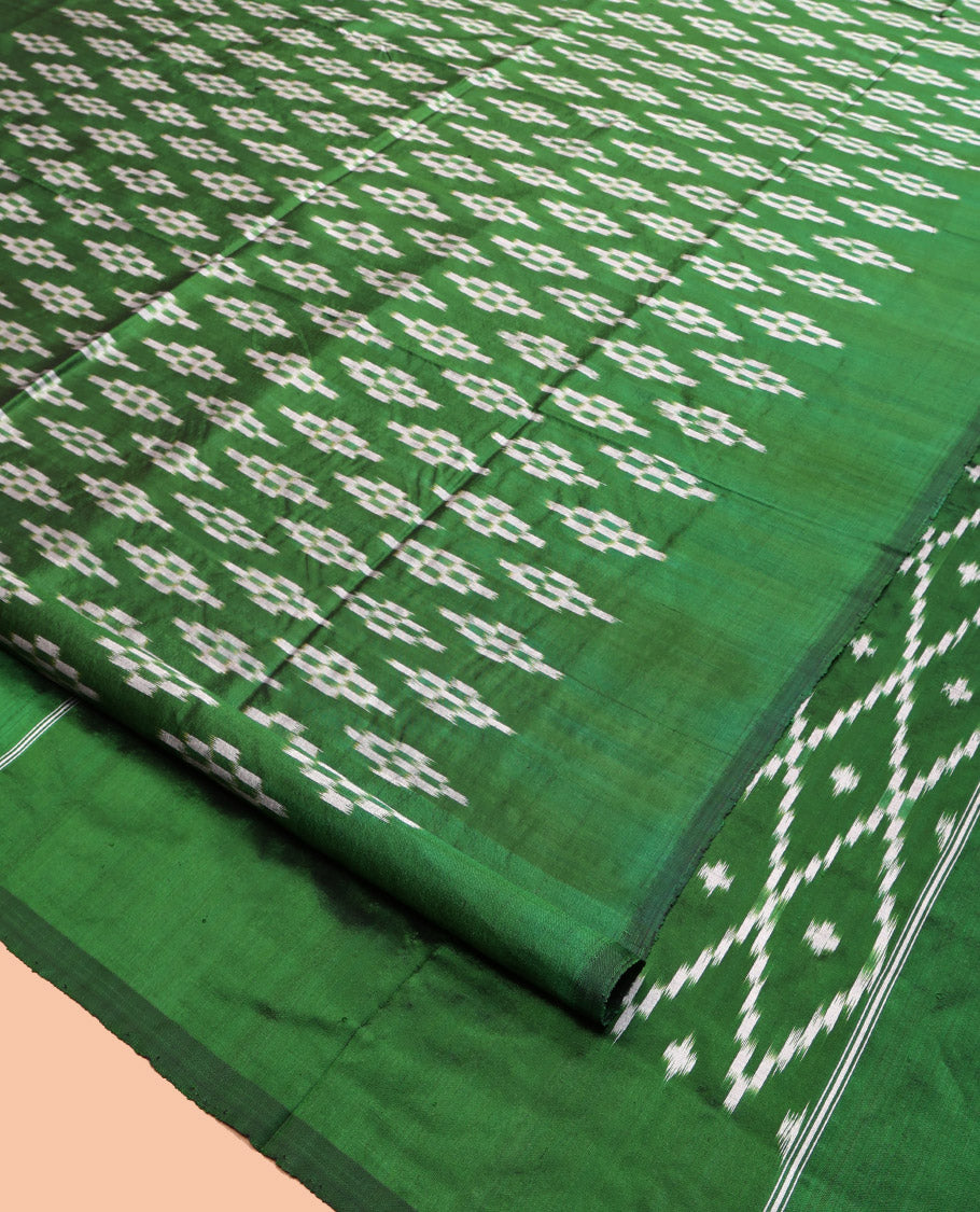 Borderless Green Pochampally Ikat Silk Saree, Steeped with Ikat Buttas, an Ikat-Style Jaal Pallu, and No Blouse