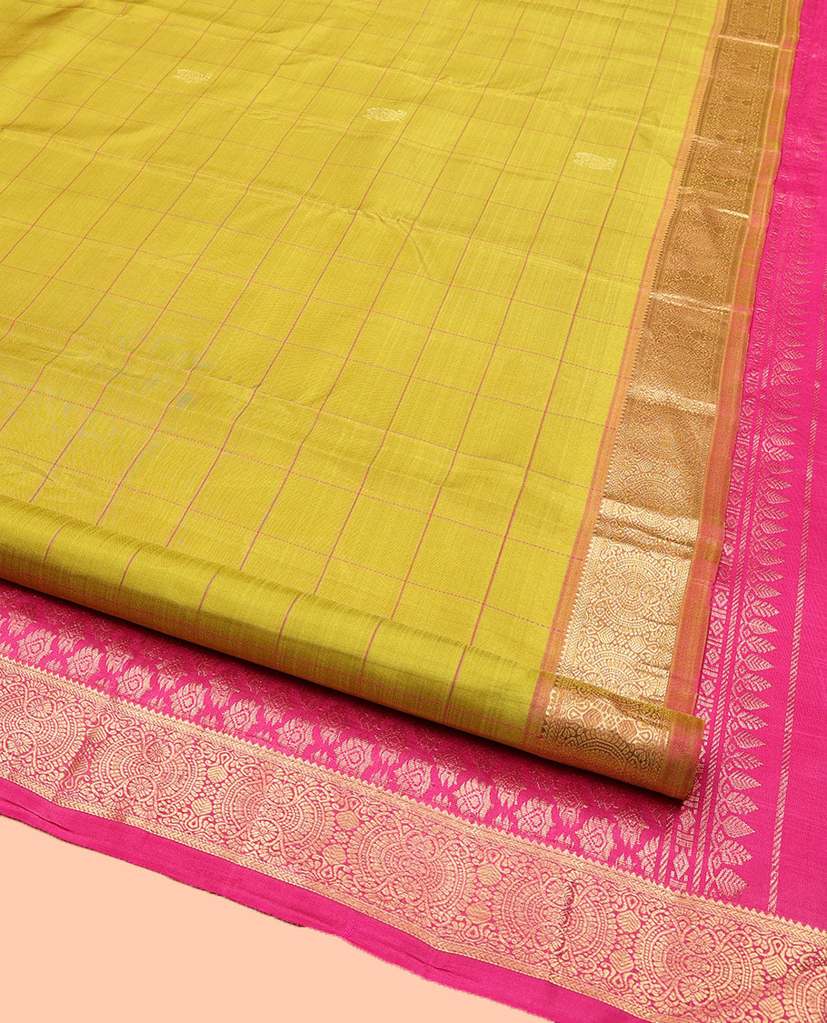 Green Kanchipuram Silk Saree, Sparsely Sparkled with Mayil Butta Enclosed Checked All Over Its Body, Complemented by a Contrast Traditional Zari Design Border, Pallu of Intricate Designs, and Paired with a Contrast Blouse
