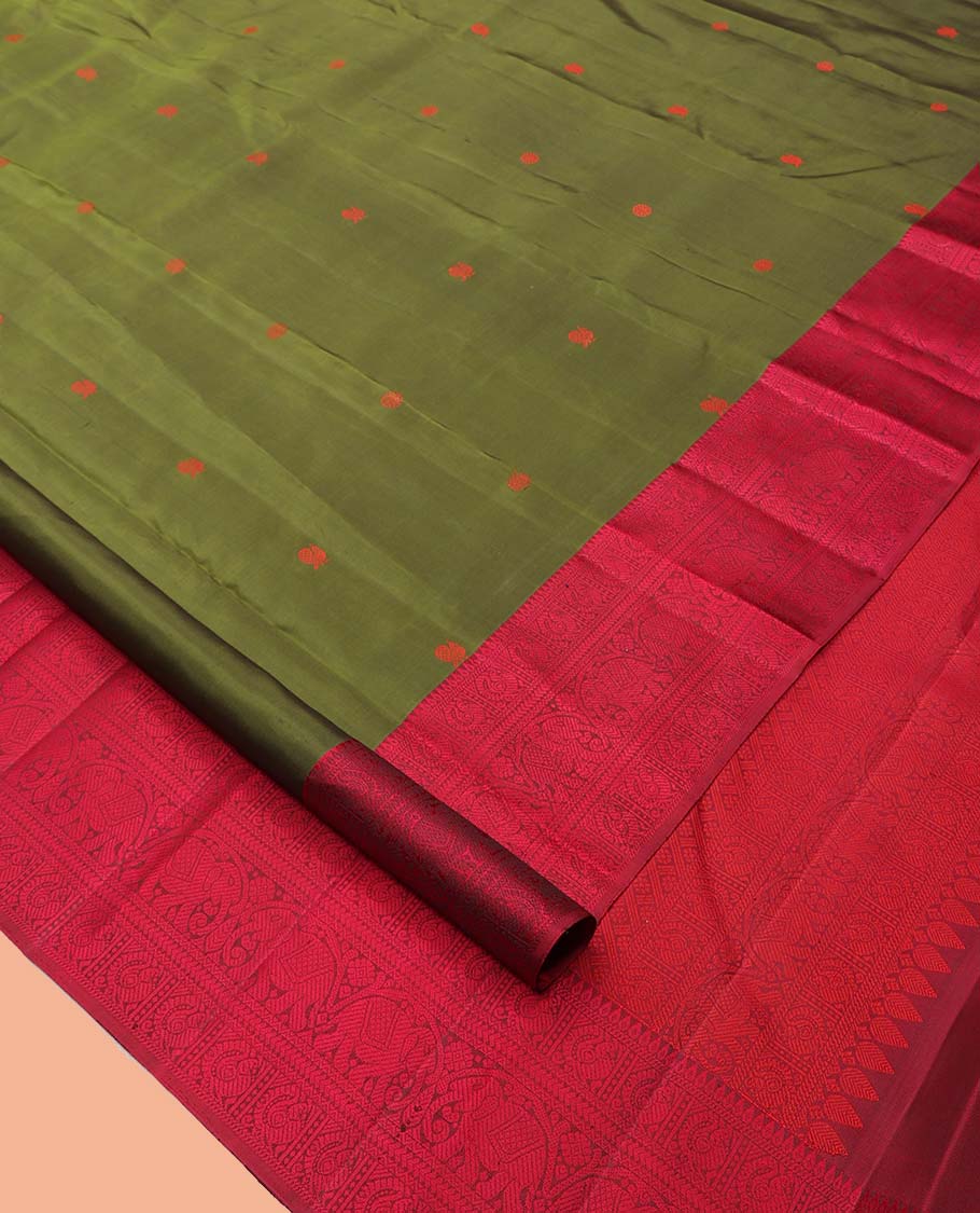 Green Kanchipuram Silk Saree, Delicately Woven with Mayil-Chakram Buttas, a Contrast Border of Thilakam, Kathir, Mayil, and Yaanai Designs, Thread-Woven Pallu, and a Contrast Blouse