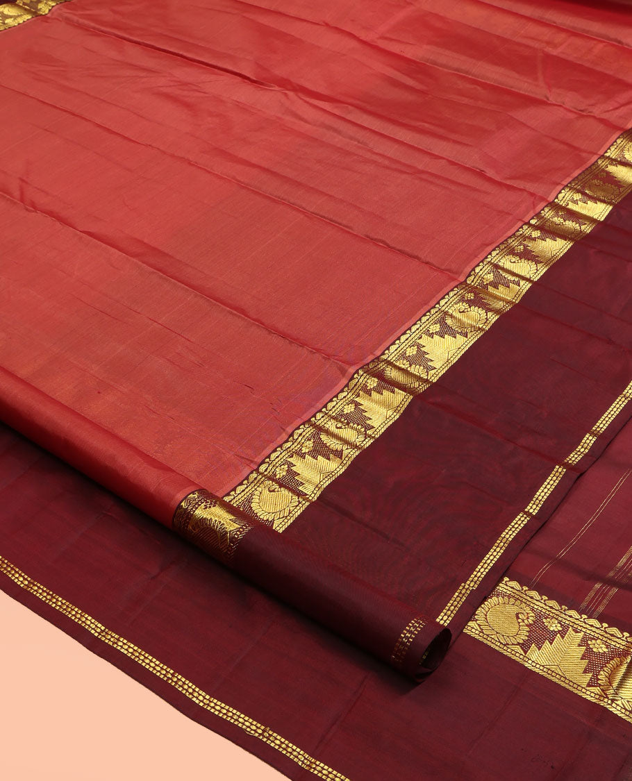 Rust Kanchipuram Silk Saree, Woven with Buttas, Complemented by a Contrast Rettai Pettu Border of Thazampoo Rekku and Arumbu Manga, Zari Design Pallu, and Contrast Blouse