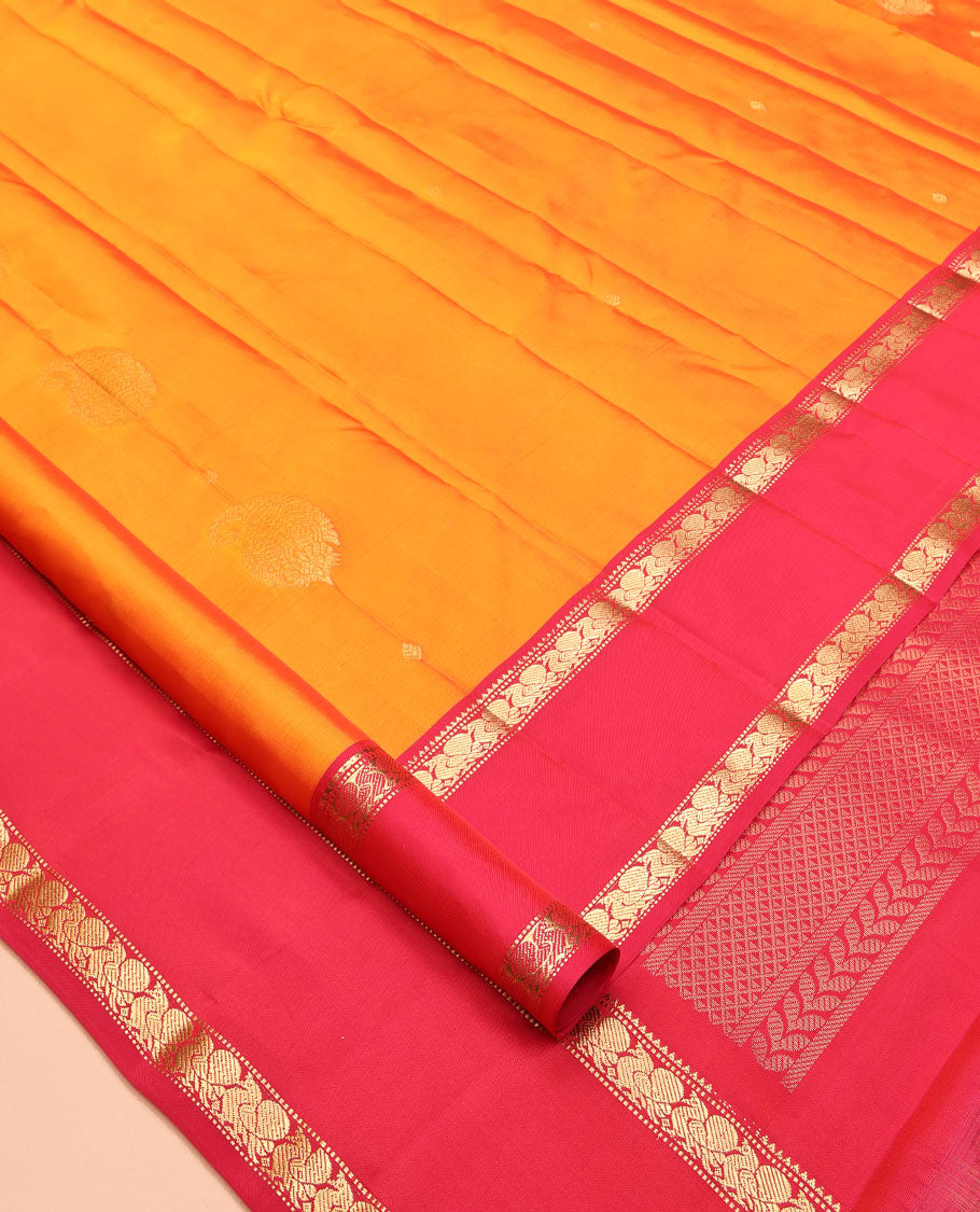 Orange Vasundhara Lite Silk Mix Saree, Ornamented with Zari Buttas, a Contrast Rettai Pettu Border of Mayil Designs, Jaal Pallu, and a Contrast Blouse