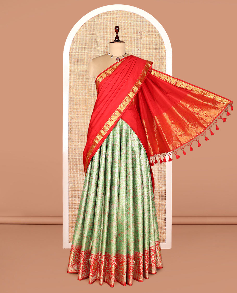 Green Art Silk Half-Saree, Decked Up with Jacquard Design, Contrast Intricate Zari Border, Paired with a Contrast Jacquard Blouse, and an Intricate Dhavani