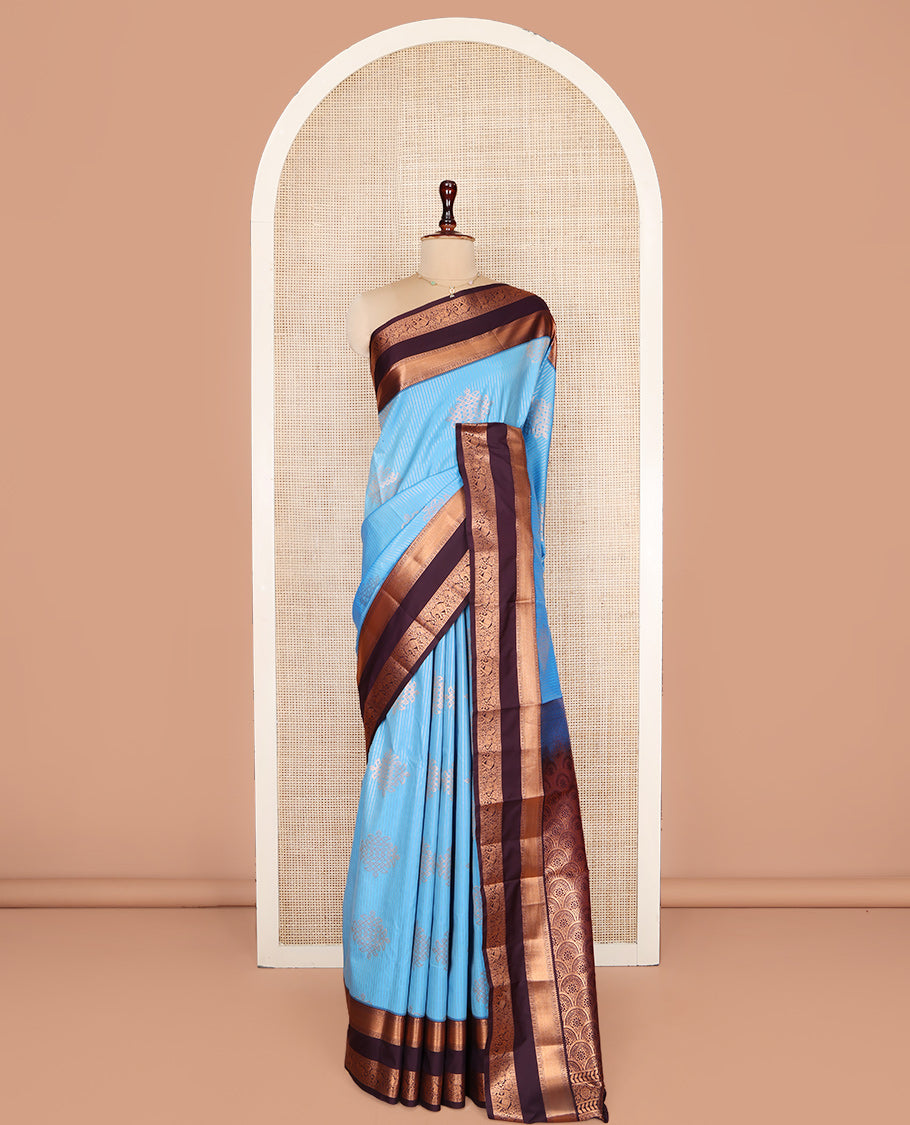 Blue Budget Silk Saree, Embellished with Zari Stripes and Kolam Buttas All Over Its Body, Complemented by a Contrast Traditional Zari Design Rettai Pettu Border, Grand Scallop Design Pallu, and Paired with a Contrast Blouse