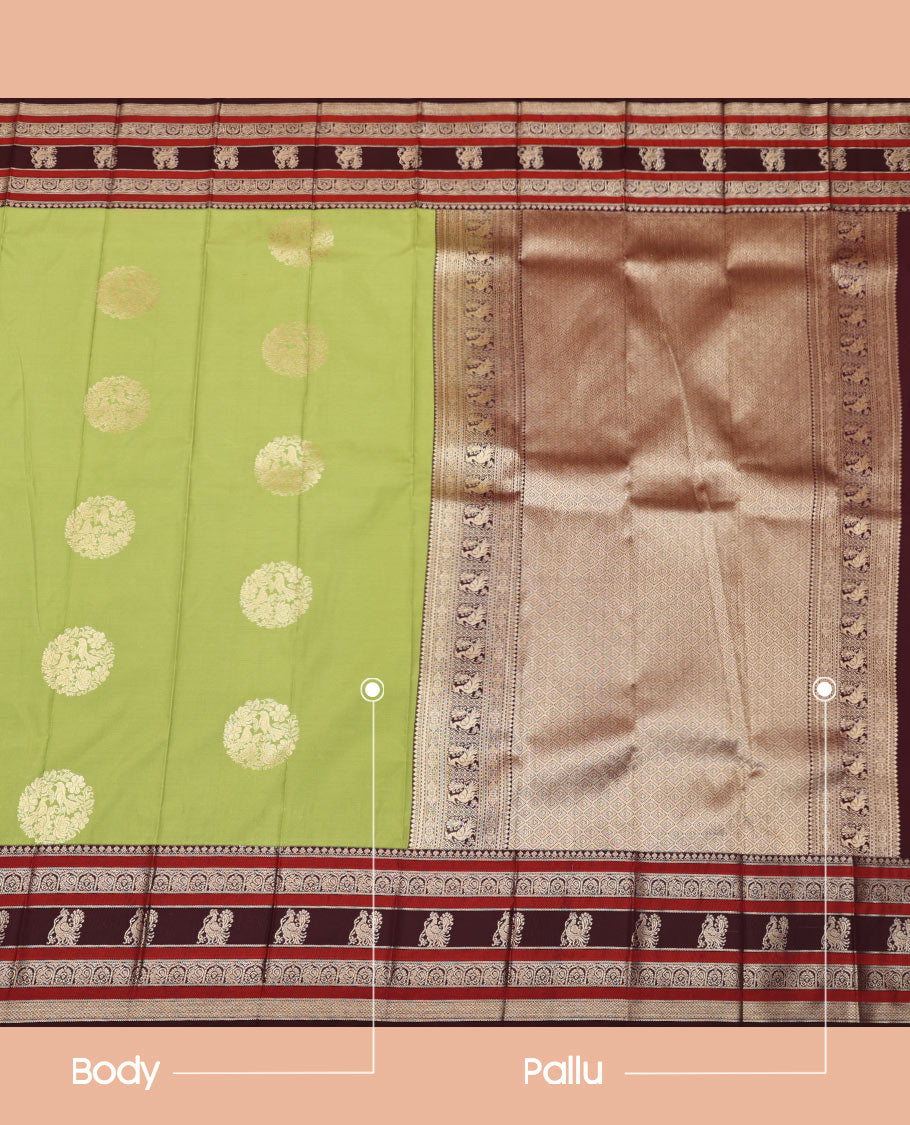 Green Budget Silk Saree, Embellished with Round Zari Buttas All Over Its Body, Complemented by Contrast Traditional Zari Designs Woven Border, Grand Jaal Pallu and Paired with a Contrast Blouse