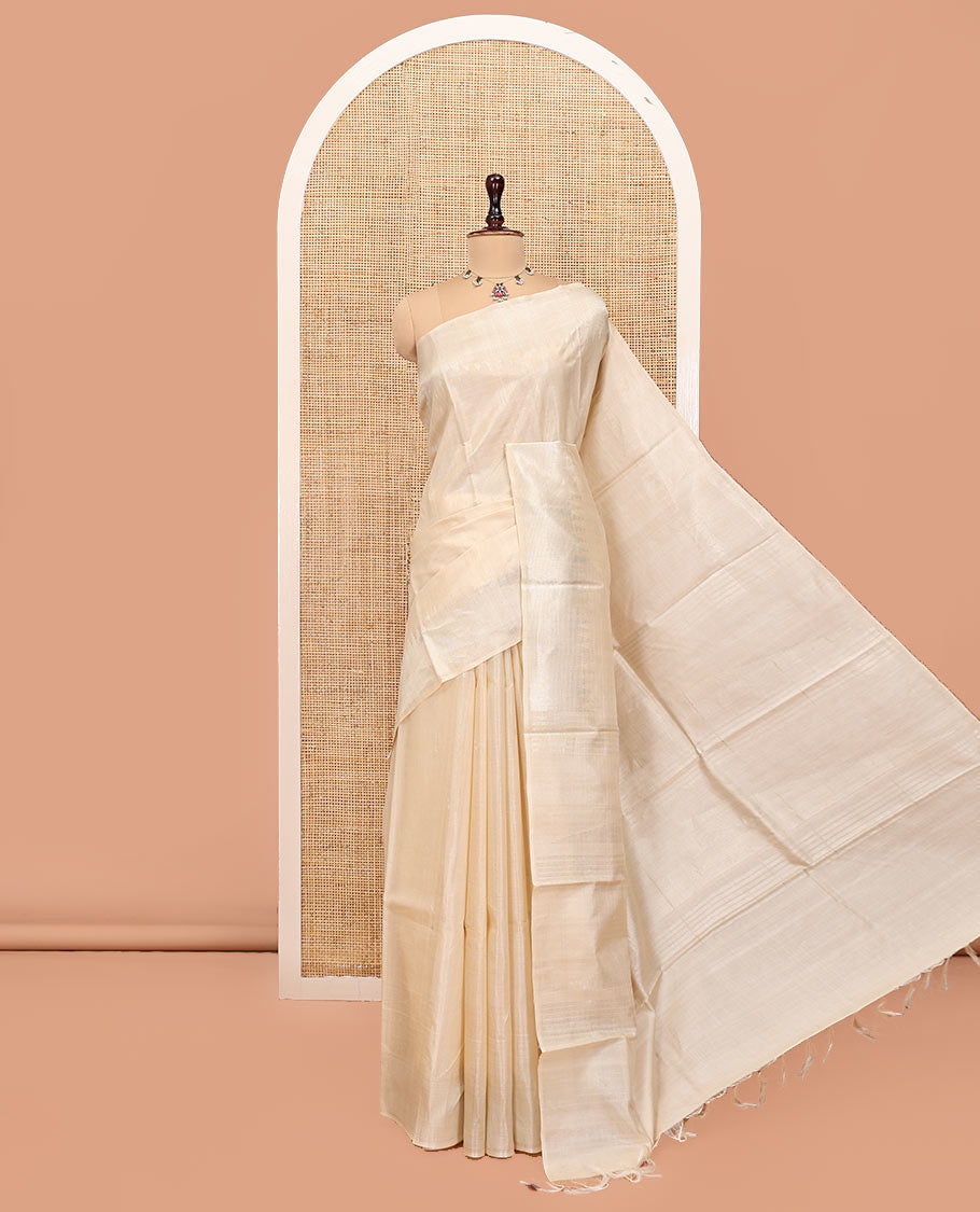Cream Plain Tussar Silk Saree, a Gleaming Temple Zari Border, a Striped Pallu, and a Matching Blouse