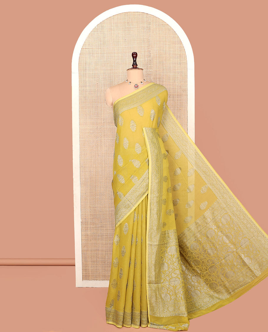 Yellow Georgette Saree, Elevated with Buttas, Highlighted by a Traditional Border, Floral Jaal Pallu, and a Matching Blouse